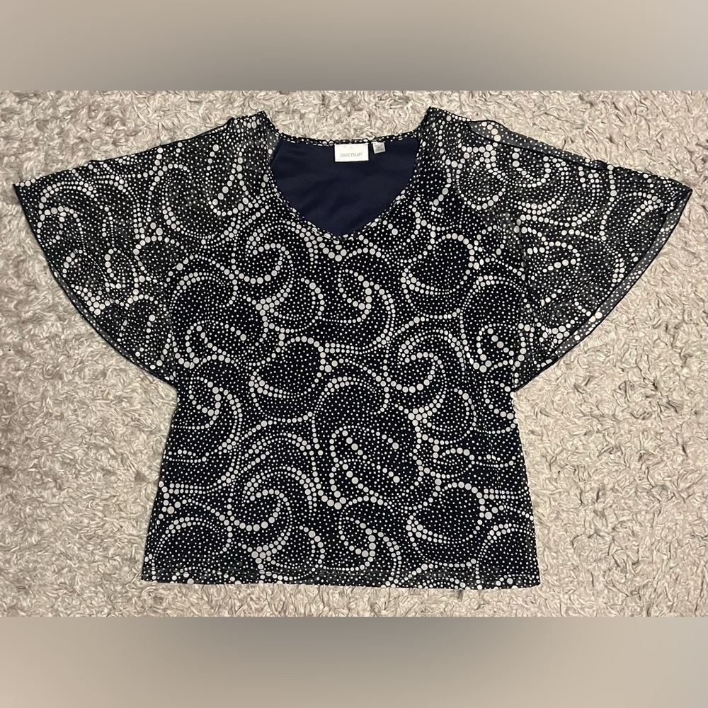 Womans dark blue, open-shoulder blouse